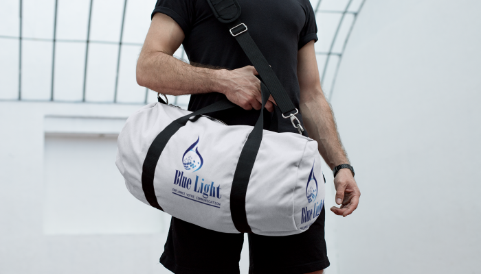 mockup-of-a-kit-bag-carried-around-a-man-s-shoulder-23062